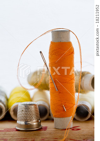 nedle with orange color thread 18211952