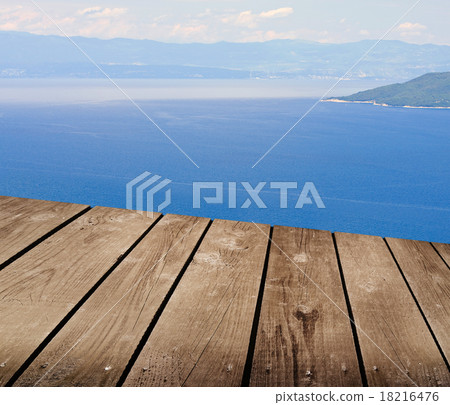 view from the terraces and empty wooden deck table view from the terraces and empty wooden deck table 18216476
