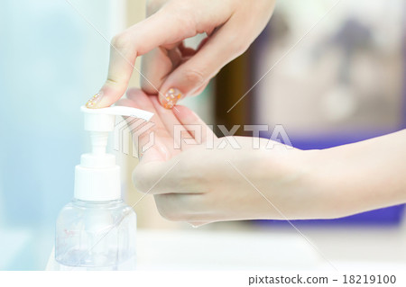 woman hand using sanitizer gel at hospital woman hand using sanitizer gel at hospital 18219100