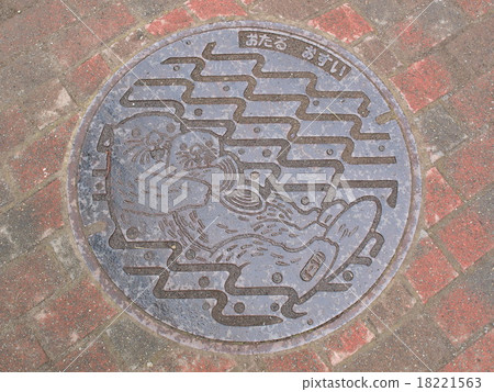 manhole drain cover in Otaru, Japan. manhole drain cover in Otaru, Japan. 18221563