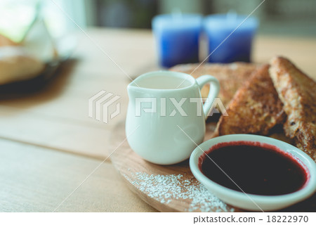 Honey toasted on wooden plate decoration  18222970