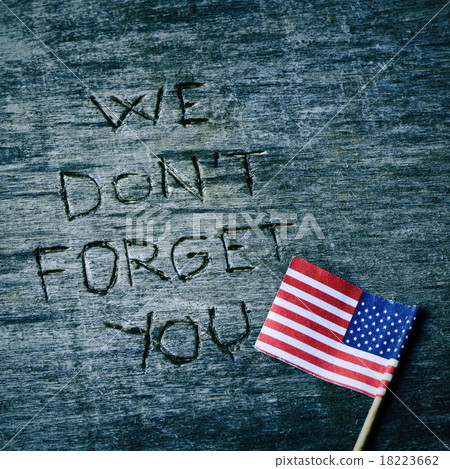 text we do not forget you and the flag of the US 18223662