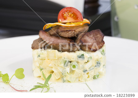 salad with meat on a table in a restaurant salad with meat on a table in a restaurant 18223899