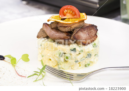 salad with meat on a table in a restaurant salad with meat on a table in a restaurant 18223900