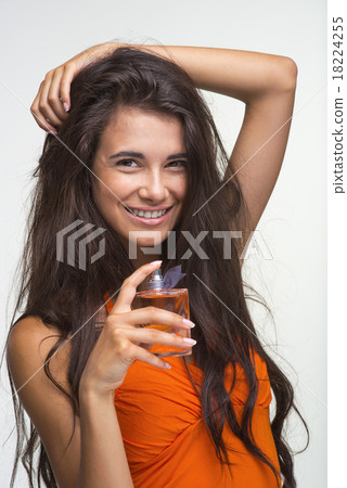 Happy quean in orange shirt is laughing. 18224255