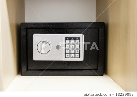 compact safe on shelf of cabinet compact safe on shelf of cabinet 18229092