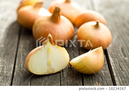 halved fresh onion on wooden table halved fresh onion on wooden table 18234267