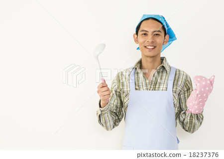 Young man's cooking image Young man's cooking image 18237376