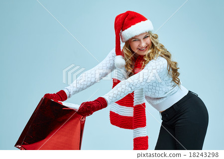 Beautiful young woman in Santa Claus clothes Beautiful young woman in Santa Claus clothes 18243298