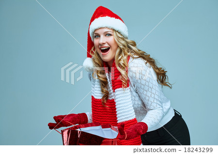Beautiful young woman in Santa Claus clothes Beautiful young woman in Santa Claus clothes 18243299