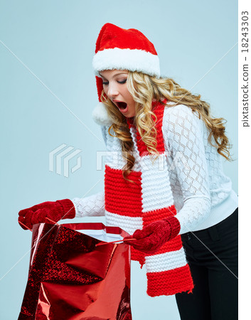 Beautiful young woman in Santa Claus clothes Beautiful young woman in Santa Claus clothes 18243303