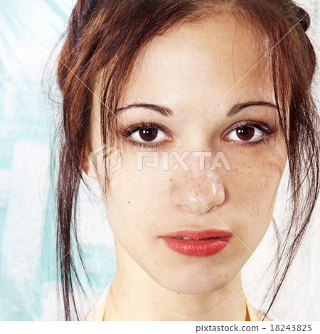 girl's face with freckles 18243825