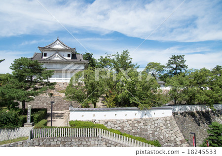 A view of the stone wall of Fukuyama Castle where the turret towers A view of the stone wall of Fukuyama Castle where the turret towers 18245533
