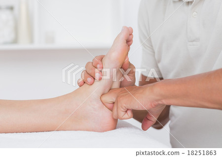 Woman having foot massage 18251863