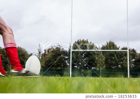 Rugby player kicking the ball Rugby player kicking the ball 18253633