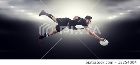 Composite image of rugby player scoring a try Composite image of rugby player scoring a try 18254004