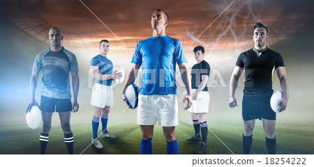 Composite image of portrait of sportsman holding rugby ball while standing Composite image of portrait of sportsman holding rugby ball while standing 18254222