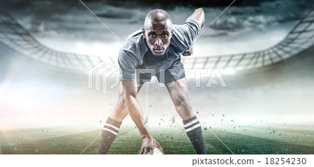 Composite image of portrait of sportsman playing rugby 18254230
