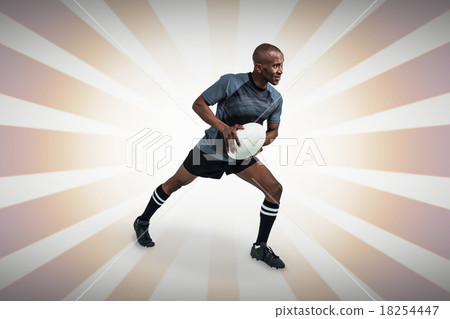 Composite image of athlete taking position to throw rugby ball 18254447