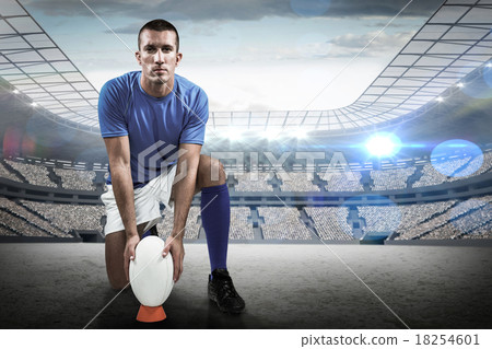 Composite image of full length portrait of rugby player placing 18254601