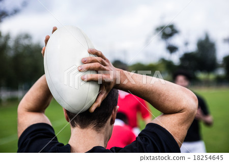 Rugby players training on pitch 18254645