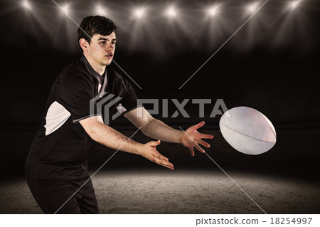 Composite image of rugby player throwing a rugby ball Composite image of rugby player throwing a rugby ball 18254997