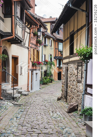 Street with half-timbered medieval houses in 18256216