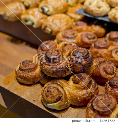 Sweet buns on cutting board. 18261722
