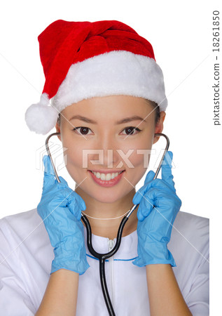 Christmas doctor with stethoscope in gloves Christmas doctor with stethoscope in gloves 18261850