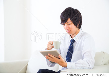 Male business morning information gathering tablet terminal before work attendance hand white background white back work home 18263582