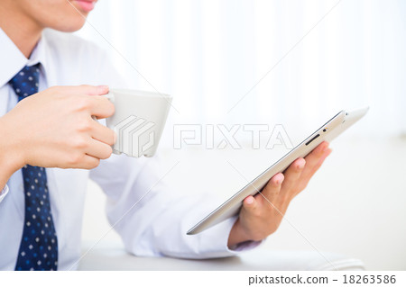 Male business morning information gathering tablet terminal before work attendance hand white background white back work home 18263586