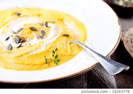 Pumpkin soup with cream, seeds and thyme Pumpkin soup with cream, seeds and thyme 18263776