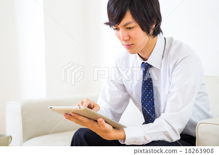 Businessman male home before work Attendant tablet terminal Internet day trading ipad 18263908
