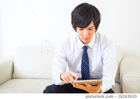 Businessman male home before work Attendant tablet terminal Internet day trading ipad 18263910