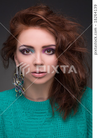 Beautiful young girl with brown hair with make-up 18264139