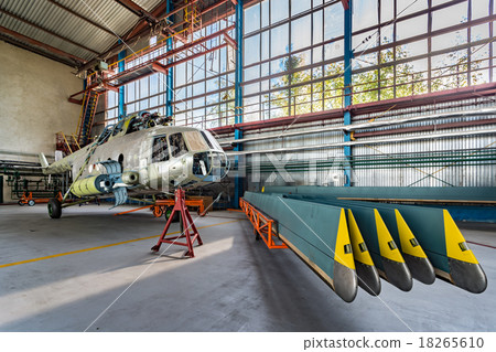 Helicopter repair stand in the hangar 18265610
