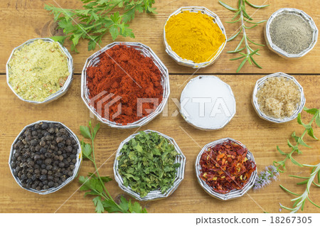 Different spices in shiny bowls 18267305