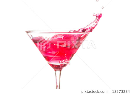Red coctail splash on white background close up 18273284