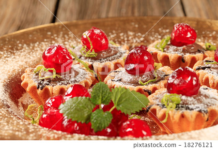 Chocolate-filled tartlets 18276121