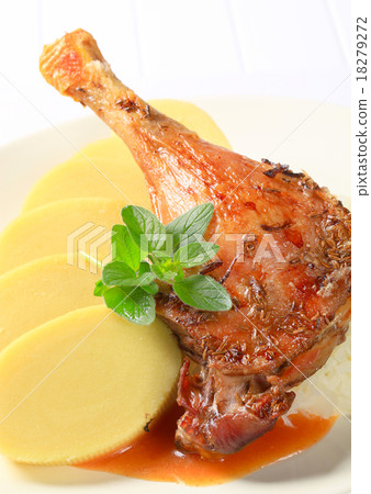 Roast duck with potato dumplings and sauerkraut Roast duck with potato dumplings and sauerkraut 18279272