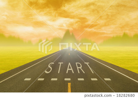 road through the field with sign start  18282680