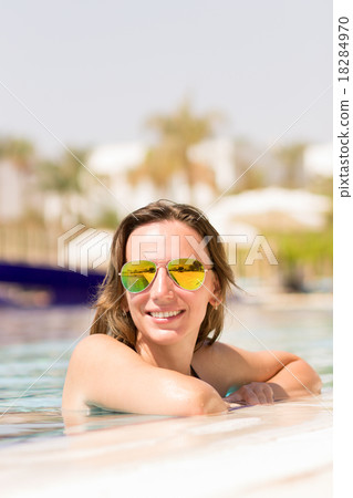 Gorgeous caucasian woman enjoying summer vacation Gorgeous caucasian woman enjoying summer vacation 18284970