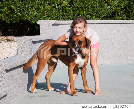 Girl caress her dog Girl caress her dog 18292704