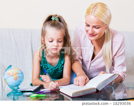 Woman and child having lesson 18293036