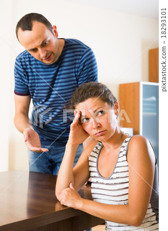 wife and furious husband discussing divorce wife and furious husband discussing divorce 18293101
