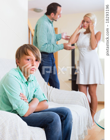 Son suffering of parents argue. 18293196