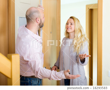Man welcomes woman 18293583
