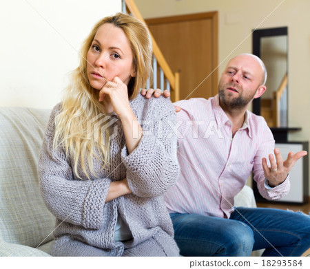 Man consoling woman 18293584