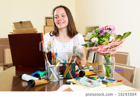 young artist paints a picture 18293884