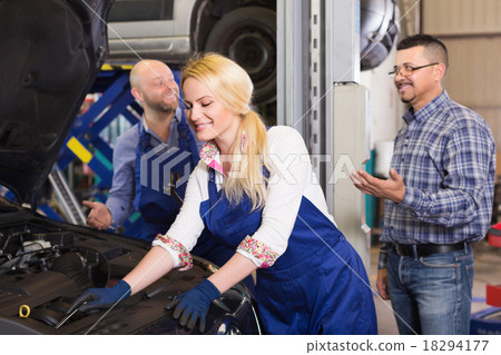 Smiling service crew and driver Smiling service crew and driver 18294177
